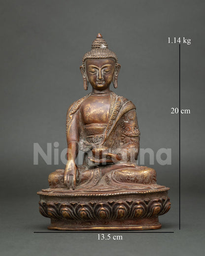 Handcrafted Shakyamuni Buddha statue from Nepal in chemically oxidized antique-finish copper.