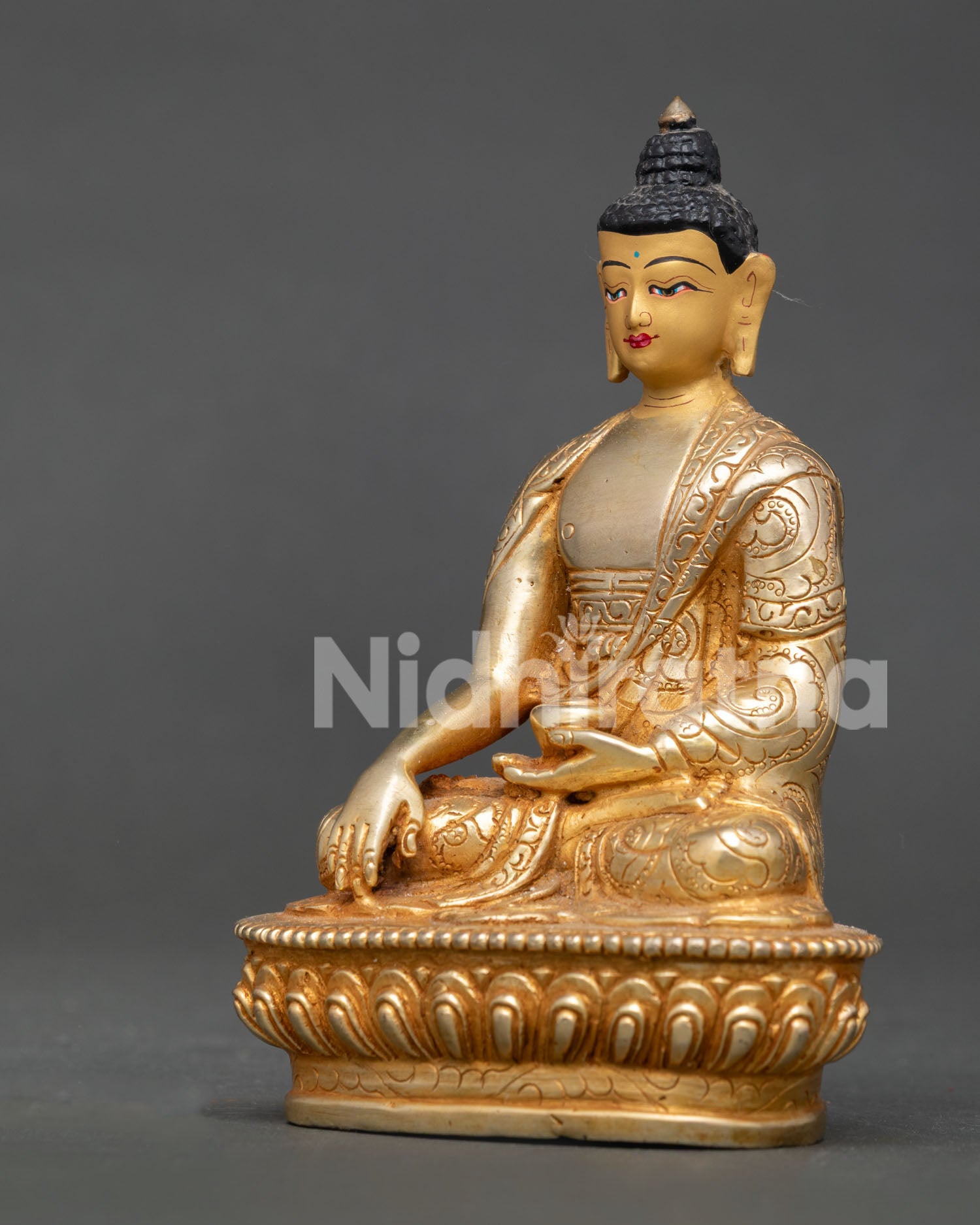Handcrafted Shakyamuni Buddha Statue from Patan, Nepal with Gold-Gilded Copper Body and Lotus Pedestal.