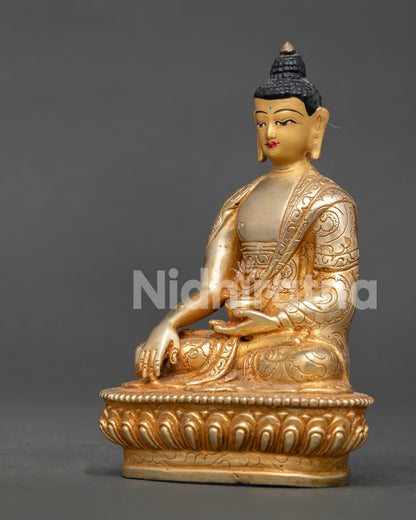 Handcrafted Shakyamuni Buddha Statue from Patan, Nepal with Gold-Gilded Copper Body and Lotus Pedestal.