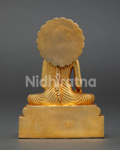 Handcrafted Shakyamuni Buddha Statue from Patan Nepal with gold gilded copper finish and serene painted face.