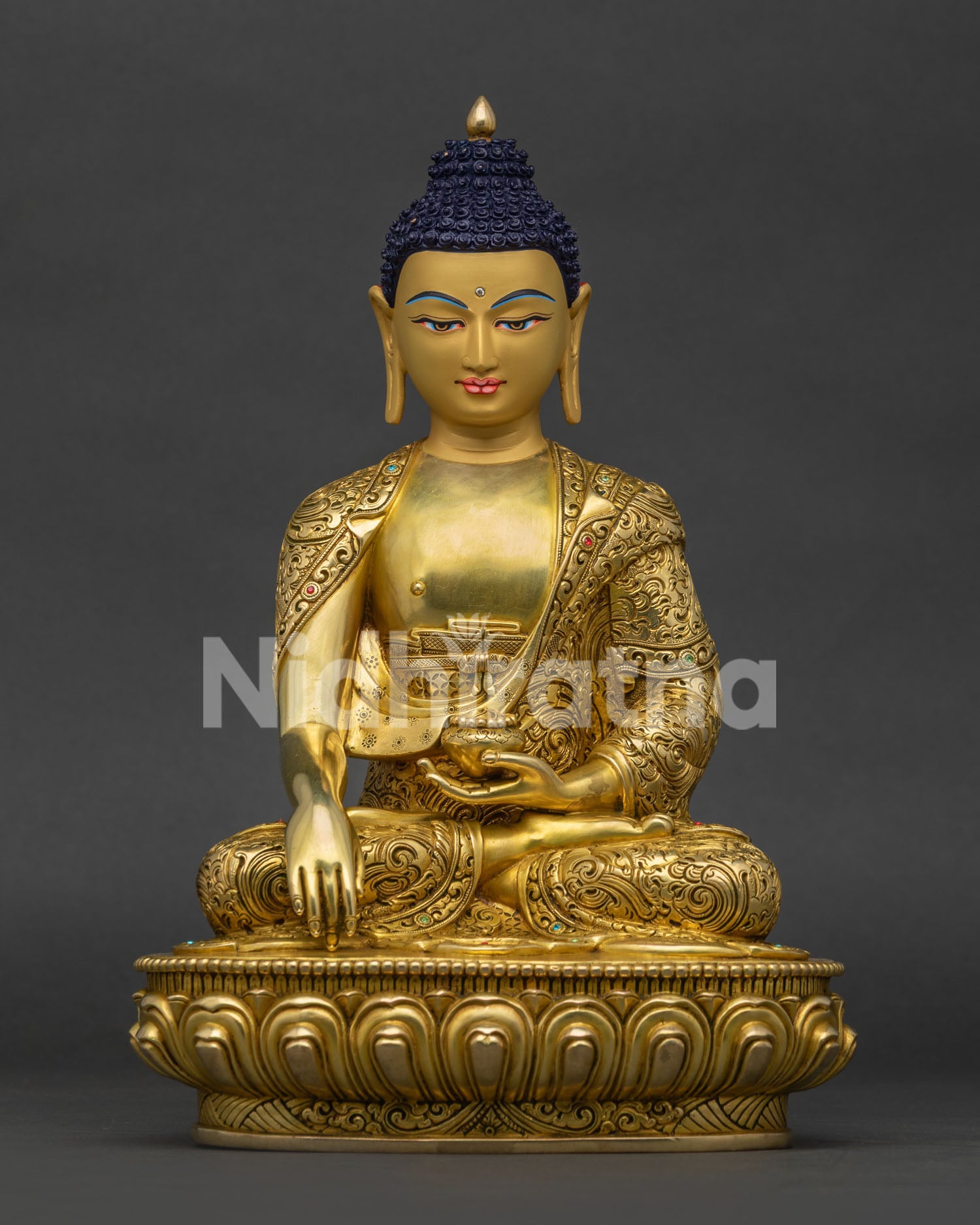 Handcrafted Shakyamuni Buddha statue in fire-gilded copper with earth-touching mudra
