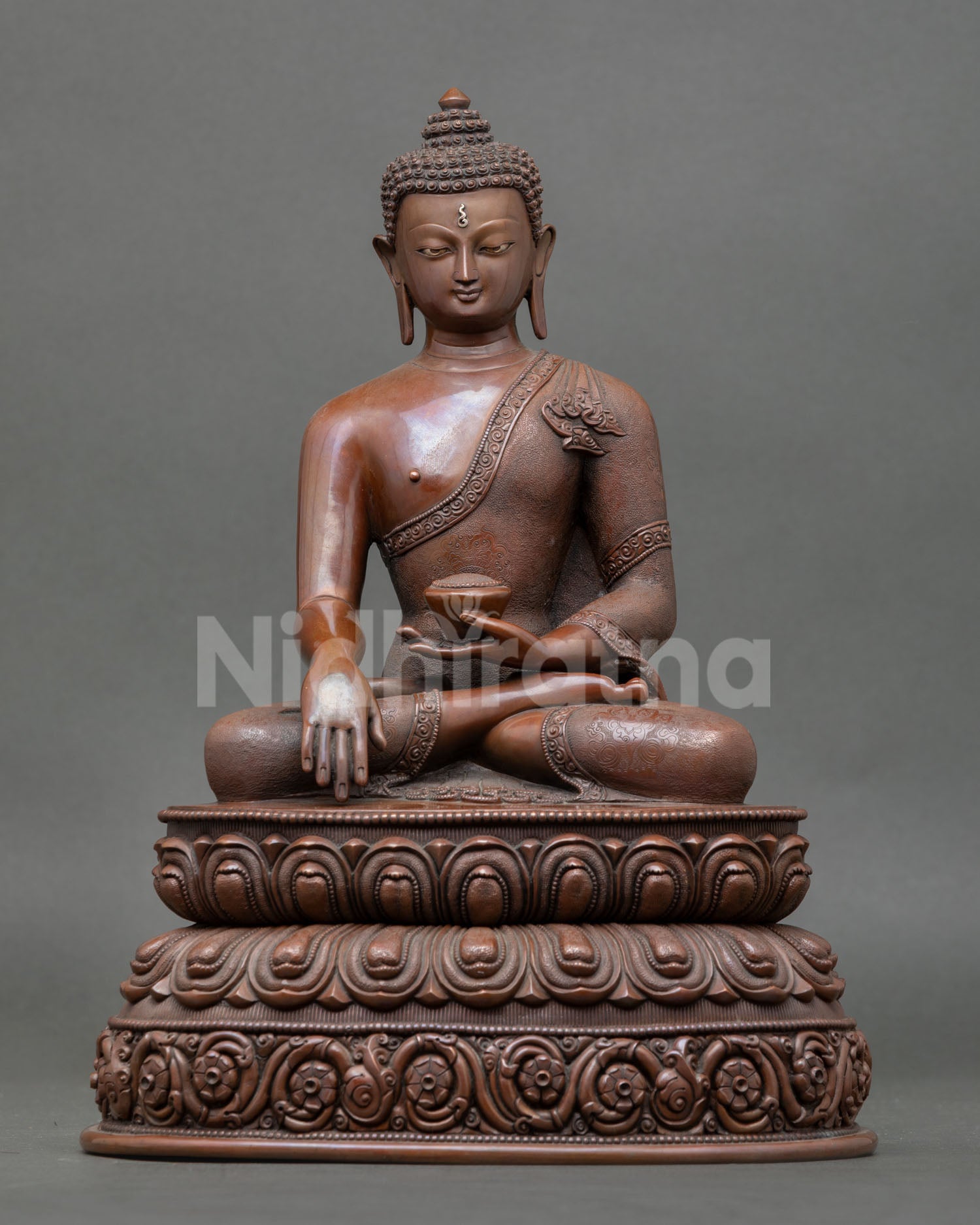 Handcrafted Shakyamuni Buddha statue in oxidized copper made by skilled Newari artisan from Patan, Nepal