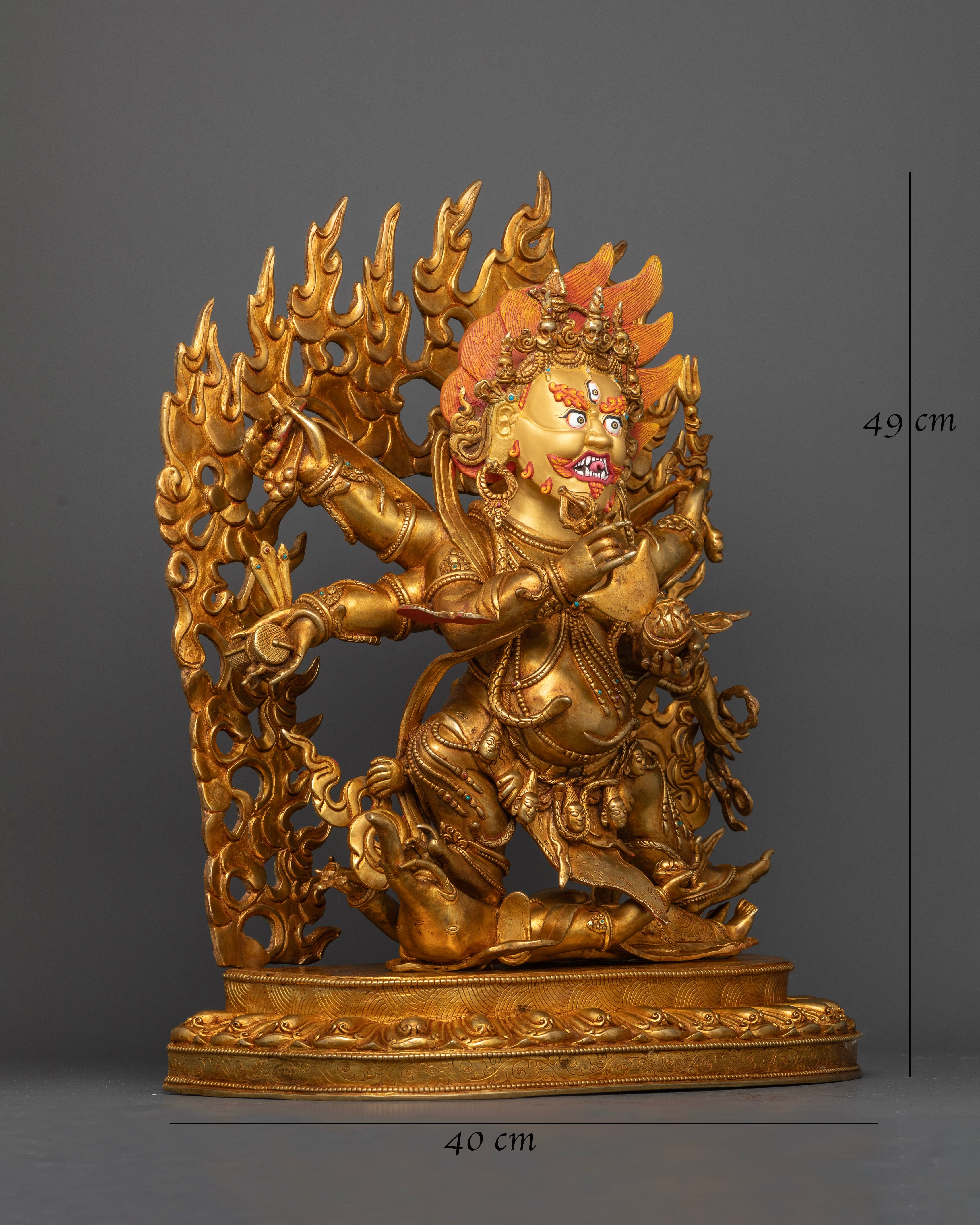 Handcrafted Six-Armed Mahakala Statue holding sacred ritual implements in dynamic posture