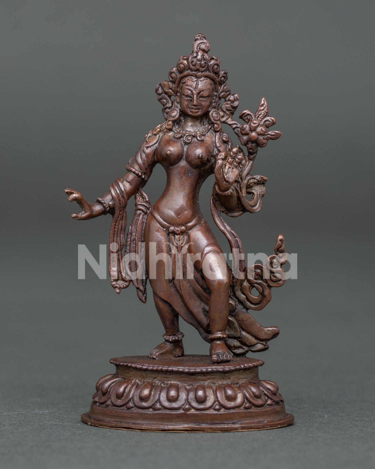 Handcrafted Standing White Tara Statue on Lotus Pedestal in Oxidized Copper from Nepal.