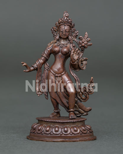 Handcrafted Standing White Tara Statue on Lotus Pedestal in Oxidized Copper from Nepal.