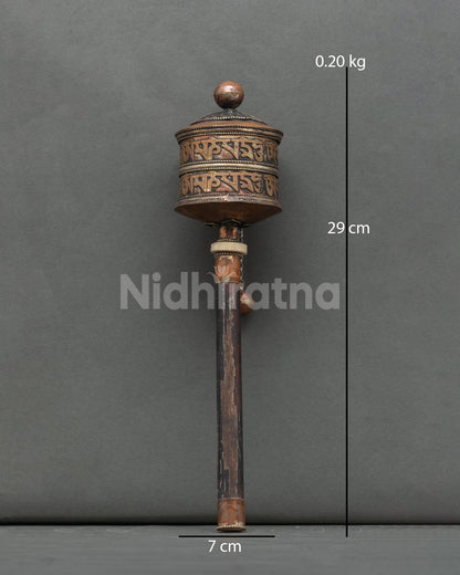 Handcrafted Tibetan Buddhist prayer wheel in silver plated copper from Patan Nepal.
