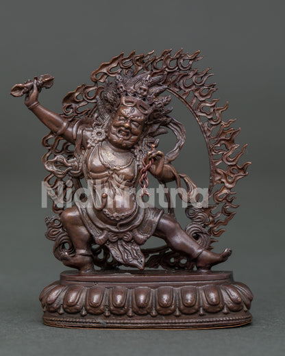 Handcrafted Vajrapani Statue standing on lotus pedestal with flaming halo in oxidized copper.