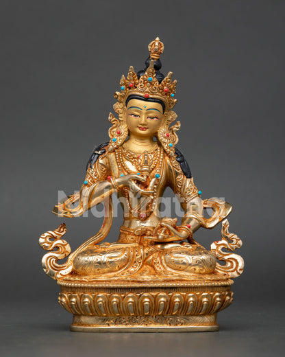 Handcrafted Vajrasattva Statue from Nepal made of copper with gold gilding and semi precious stone details.