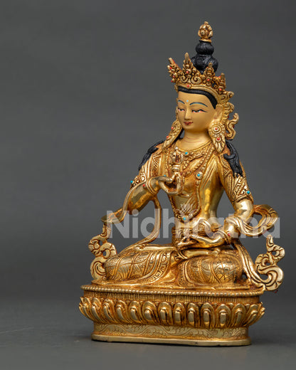 Handcrafted Vajrasattva Statue in gold gilded copper with semi precious stones from Nepal.