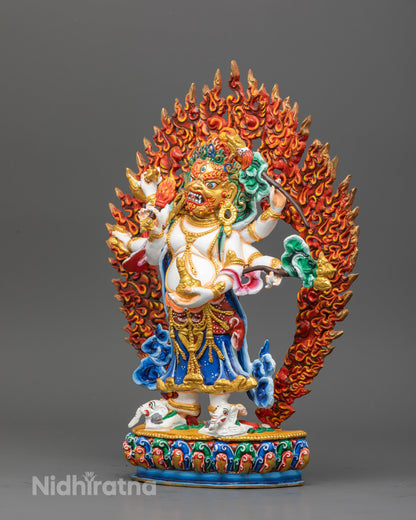 Handcrafted White Mahakala statue with gold gilded details on multicolor lotus.