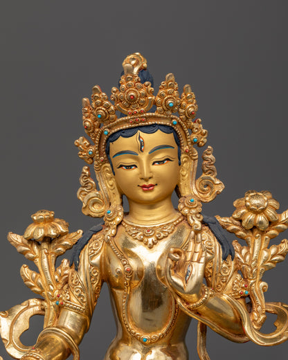 Handcrafted White Tara Buddhist deity statue from Patan Nepal with gold painted face