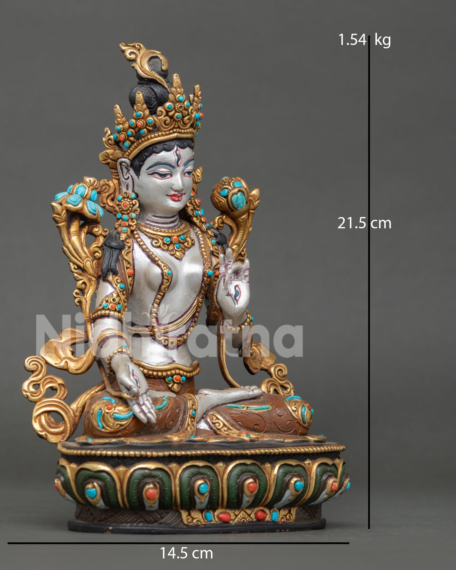 Handcrafted White Tara Buddhist statue from Nepal with seven eyes and intricate details