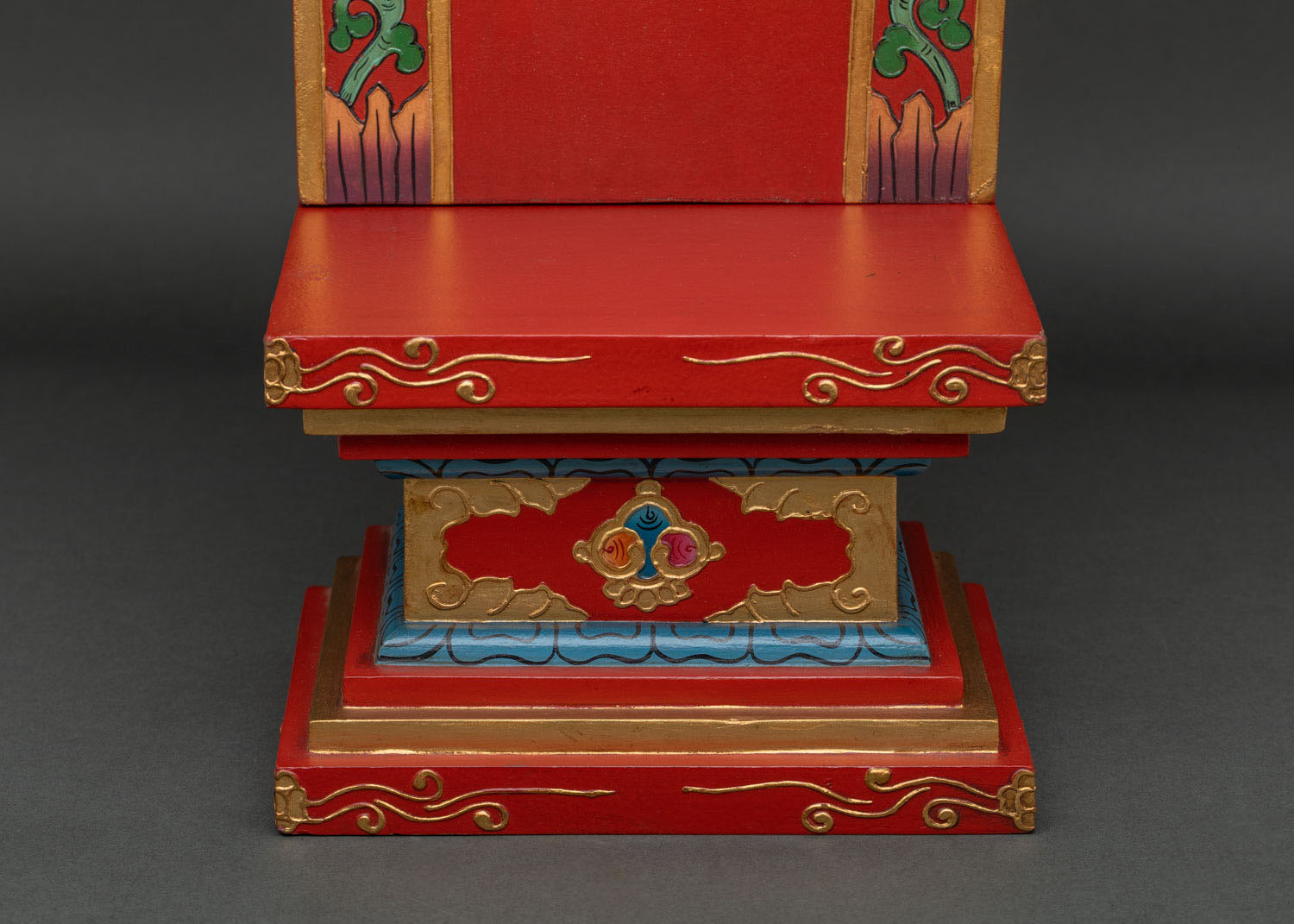 Handcrafted wooden Buddhist throne with ornate carved details from Nepal