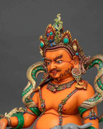 Handcrafted Yellow Dzambhala Buddhist sculpture showcasing traditional Newari craftsmanship for Buddhist altars, home shrines, and meditation spaces.