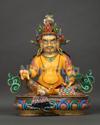Handcrafted Yellow Dzambhala Buddhist statue front, gold-gilded copper with mongoose and citron, Nepal artisan