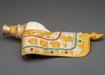 handcrafted Himalayan conch shell depicting Buddhist masters and auspicious symbols