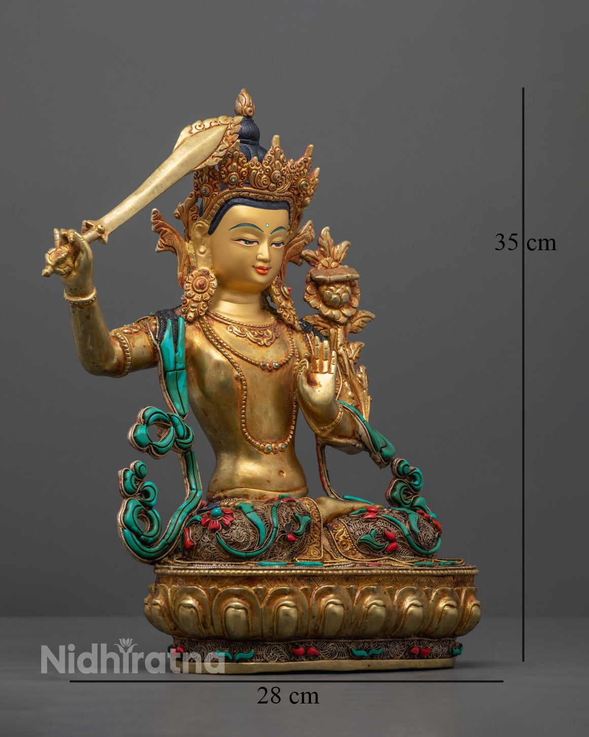 handcrafted Manjushri statue in radiant gold-gilded copper, highlighting the sword of wisdom and elegant detailing on the lotus base