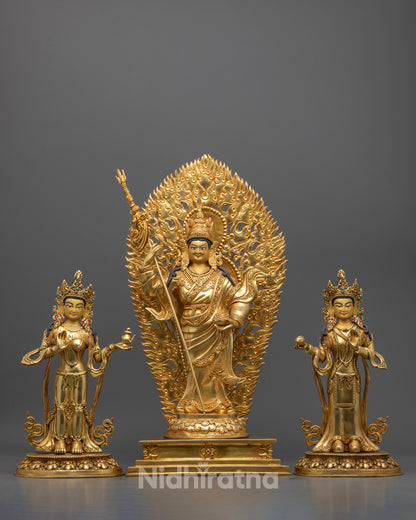 handcrafted Padmasambhava with Disciple Statue featuring 24k gold fire-gilded body, gold-gilded face, and intricate dhonka robe detailing – traditional Tibetan Buddhist art.