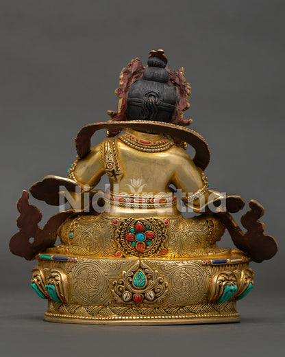 Handmade copper Dzambhala statue with semi precious stones and traditional Vajrayana craftsmanship