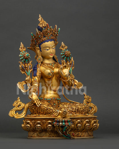 Handmade Green Tara Buddhist statue from Nepal showing detailed craftsmanship, right side view
