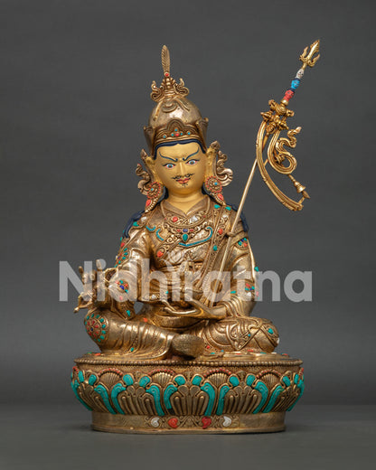 Handmade Guru Rinpoche Statue from Nepal with gold fire gilding and gold-painted face