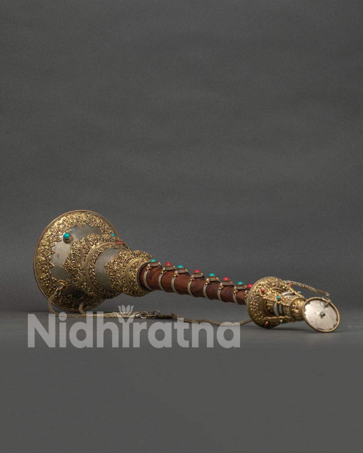Handmade Himalayan gyaling ritual instrument showing detailed Nepalese metalwork craftsmanship