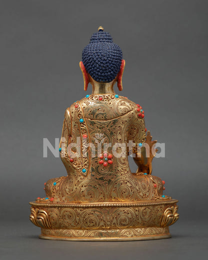 Handmade Medicine Buddha Statue featuring intricate kasaya robe patterns and traditional Newari Buddhist craftsmanship