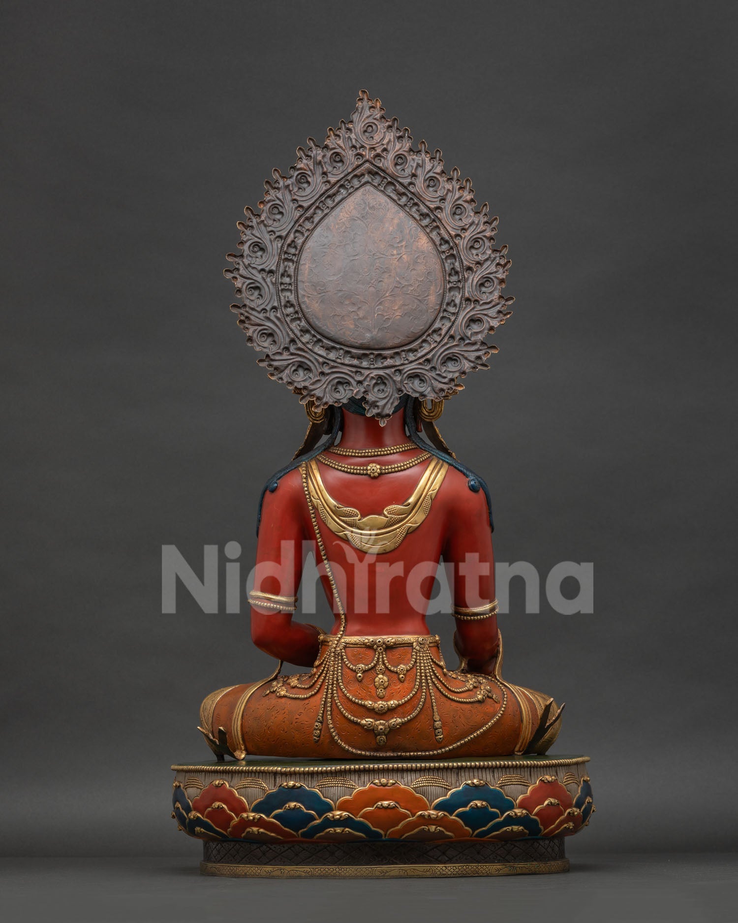 Handmade Mitrugpa Buddha statue back view showing detailed gold gilded craftsmanship