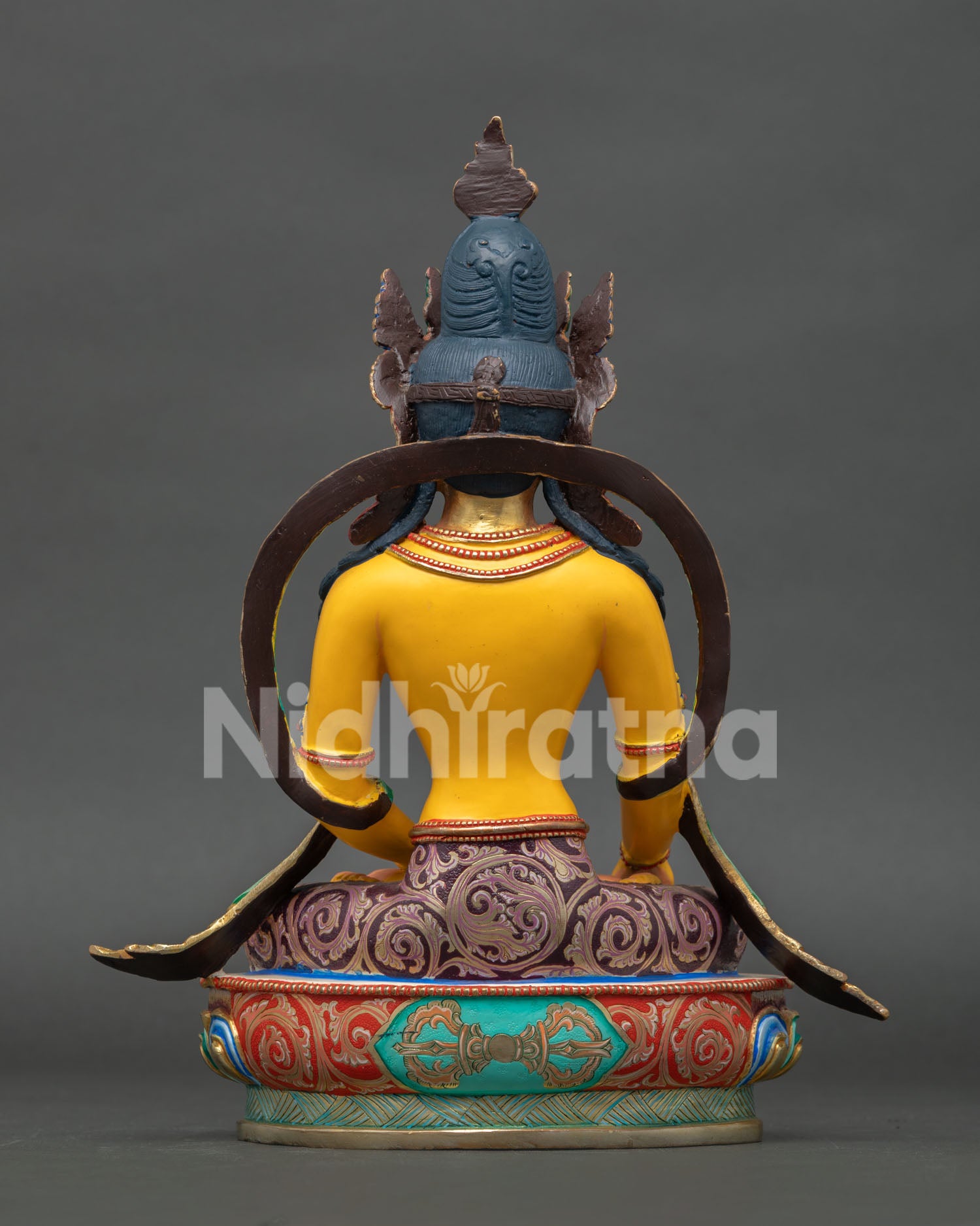 Handmade Nepalese copper Shakyamuni Buddha statue with colorful acrylic paint and sacred meditation posture