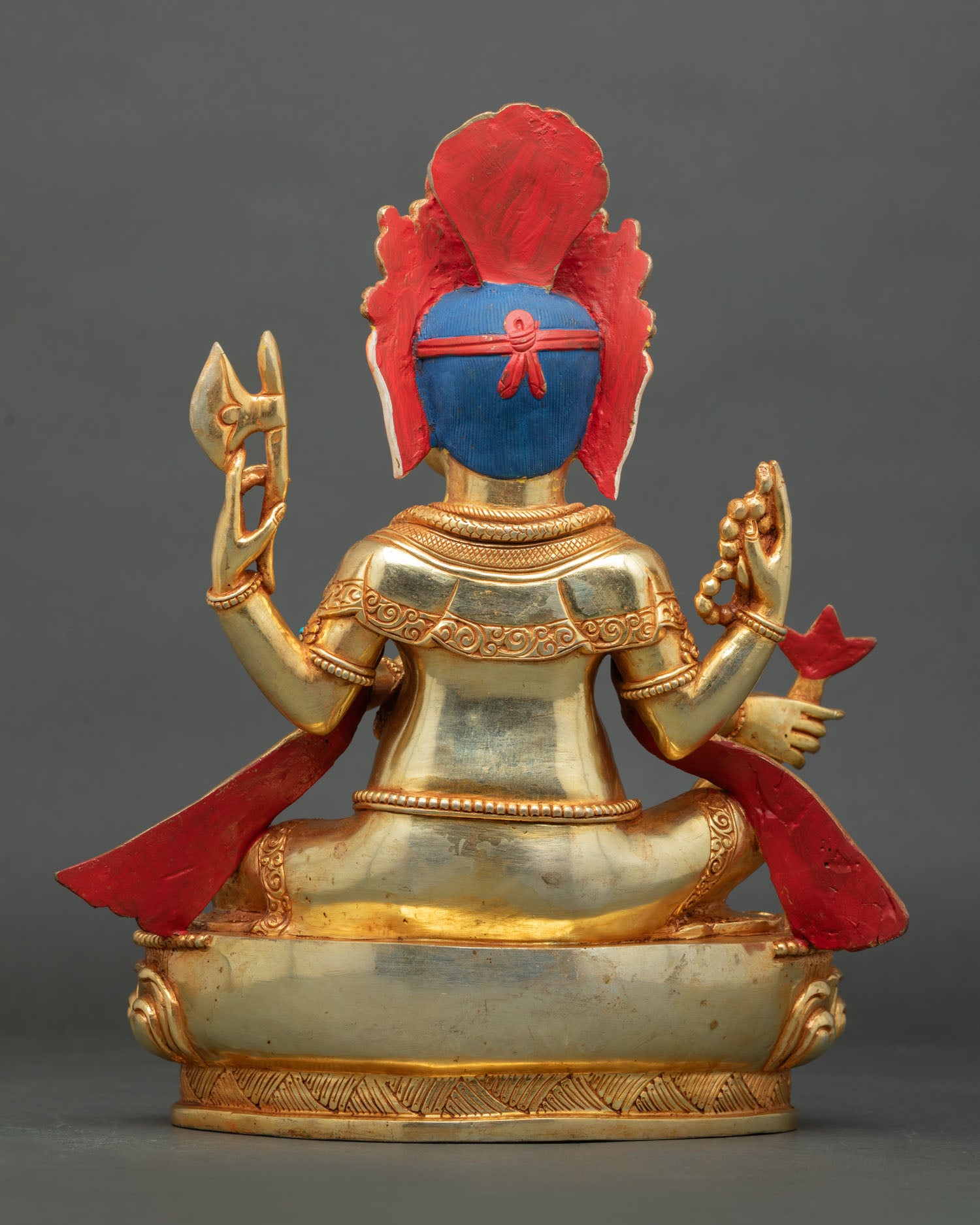 Handmade Nepalese Ganesh statue seated in royal ease posture for altar and home decor