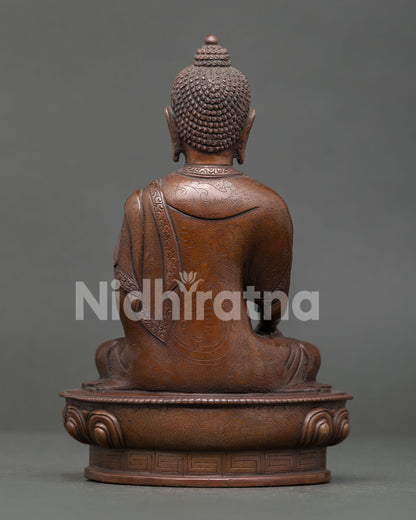 Handmade Shakyamuni Buddha statue from Nepal featuring lotus seat, sacred mudra, and peaceful home altar meditation decor.