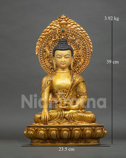 Handmade Shakyamuni Buddha statue from Nepal, front view with 24K gold fire-gilded copper and halo