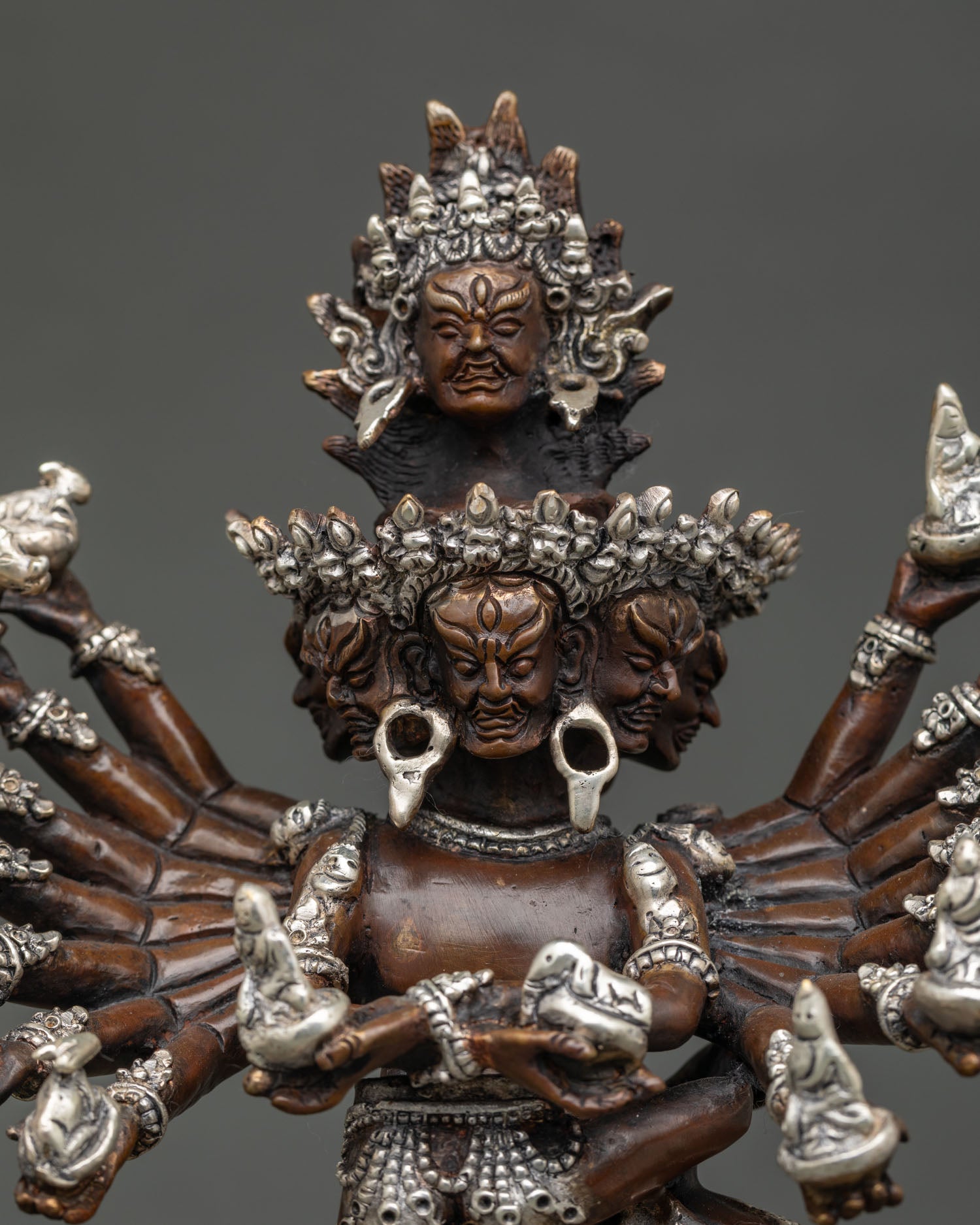 Hevajra statue silver plated details intricate engravings and Nepalese metal craftsmanship.