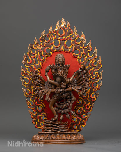 Hevajra statue with chemically oxidized copper finish and wrathful expression.
