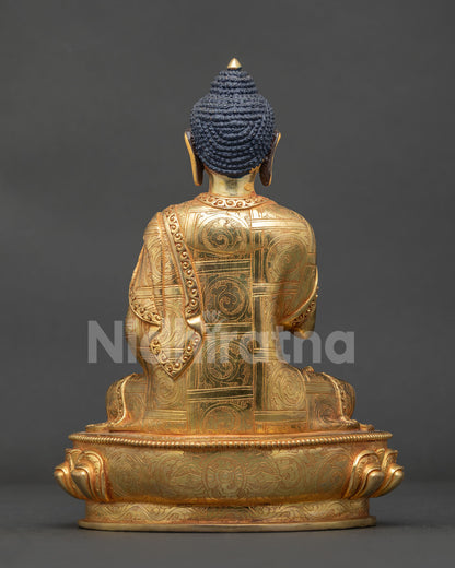 Himalayan Amoghasiddhi Buddha statue Newari artisan gold gilded.
