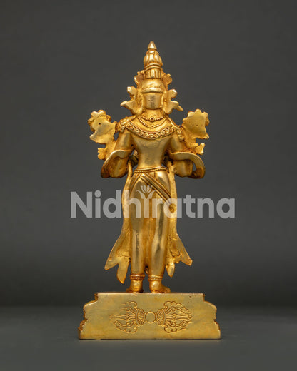 Himalayan Buddhist statue featuring lapis lazuli body gold gilding and coral embellishments