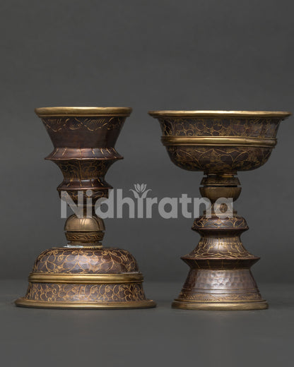 Himalayan butter lamp set symbolizing light, wisdom, and spiritual enlightenment