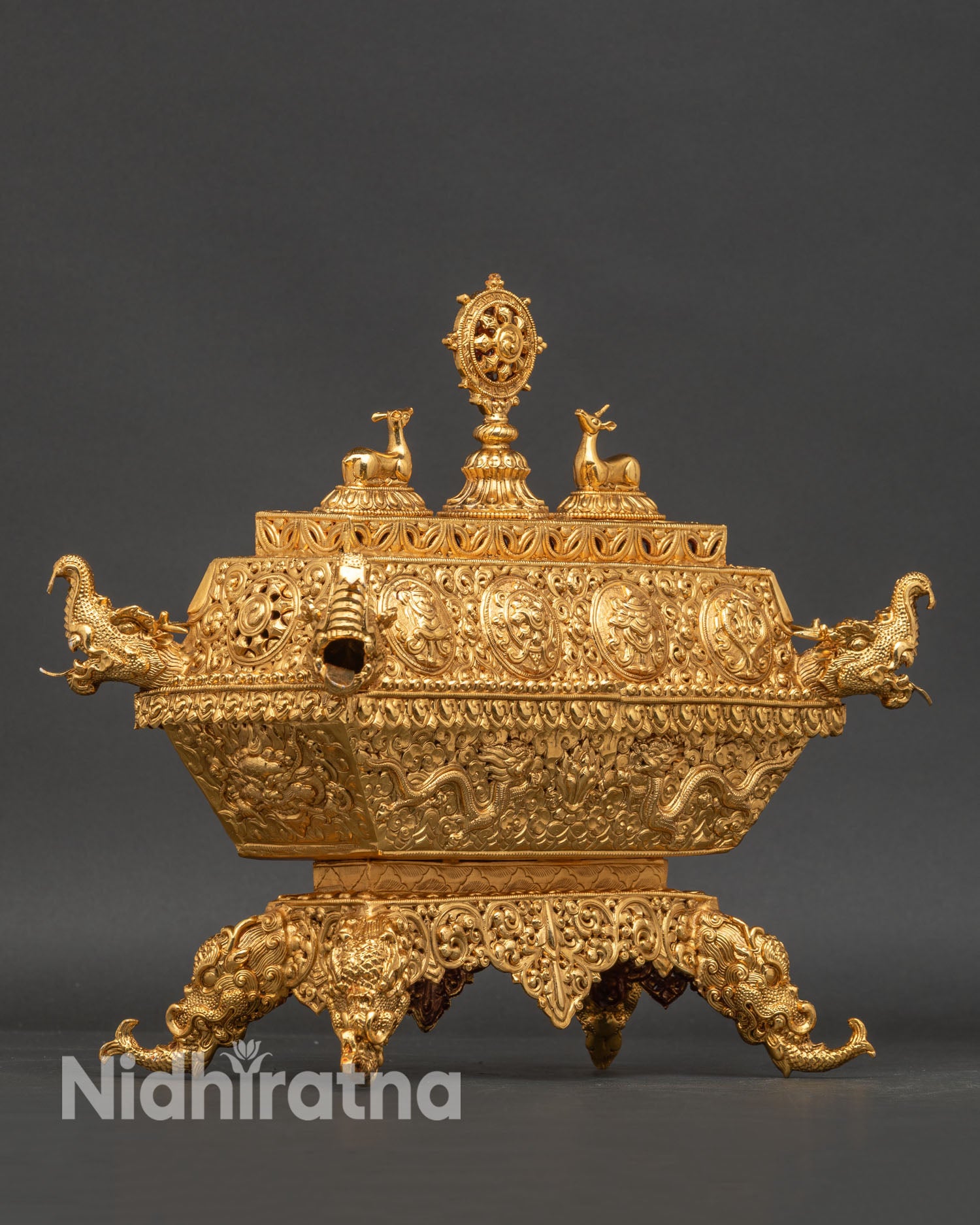 Himalayan gold-plated copper incense burner with traditional Newari Buddhist carvings