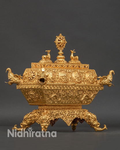 Himalayan gold-plated copper incense burner with traditional Newari Buddhist carvings