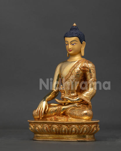 Himalayan Mitrugpa statue copper sculpture vajra and lotus pedestal side view.