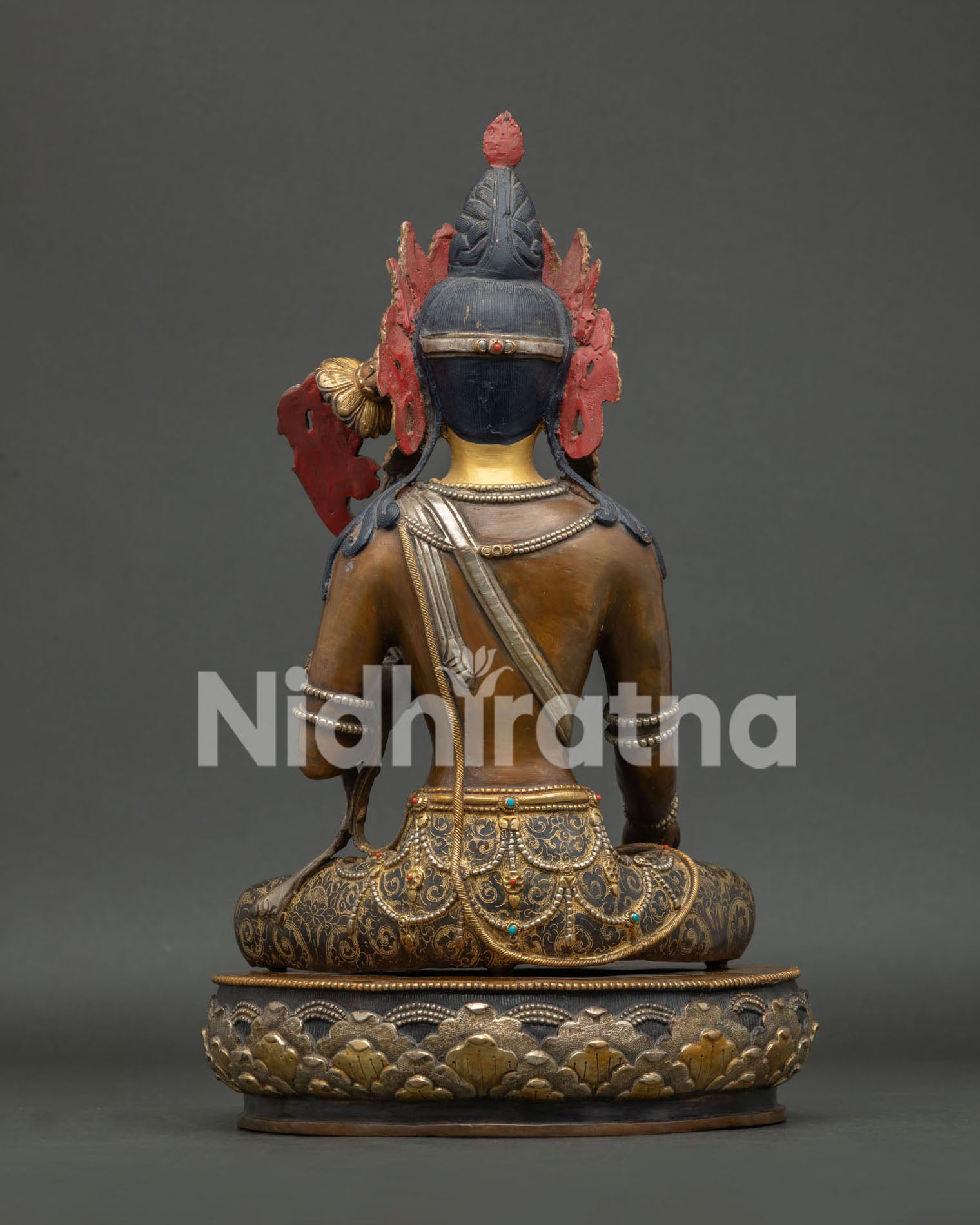 Himalayan white tara statue symbolizing compassion healing protection and longevity.
