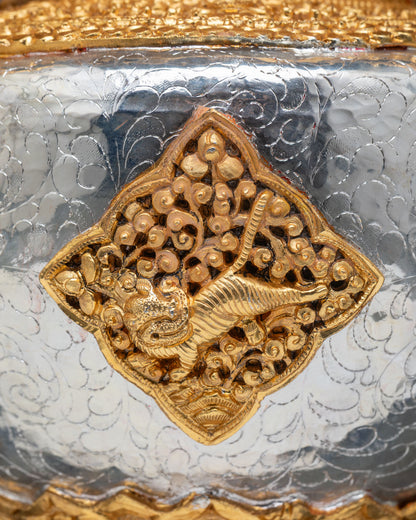 Incense burner with intricate Nepalese craftsmanship and sacred symbols