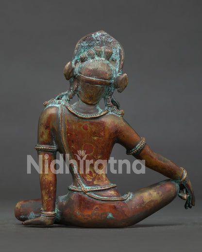 Indra Buddhist statue showing traditional crown dhoti and detailed Nepalese metal art.
