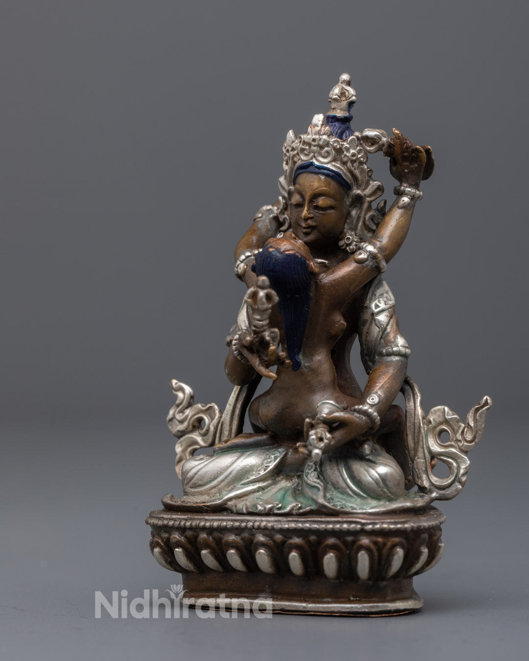 intricate acrylic-painted flowing robe and silver-plated jewelry on Vajrasattva statue