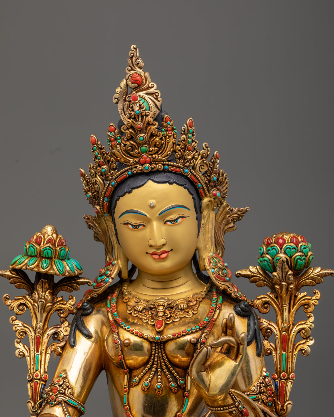  intricately carved crown and jewelry on Mother Green Tara sculpture decorated with semi-precious stones
