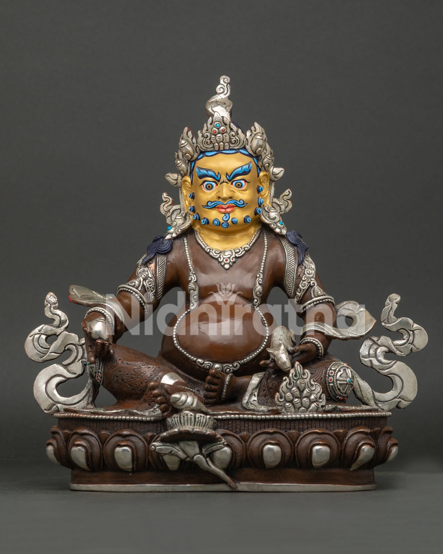 Jambhala statue, handmade in Nepal, copper with oxidized and silver plated finish, gold painted face