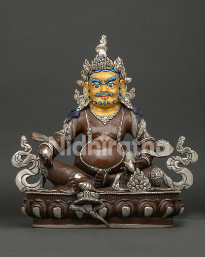 Jambhala statue, handmade in Nepal, copper with oxidized and silver plated finish, gold painted face