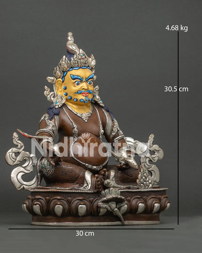 Jambhala statue, seated on lotus pedestal, holding mongoose and wish fulfilling jewel, symbolizing abundance