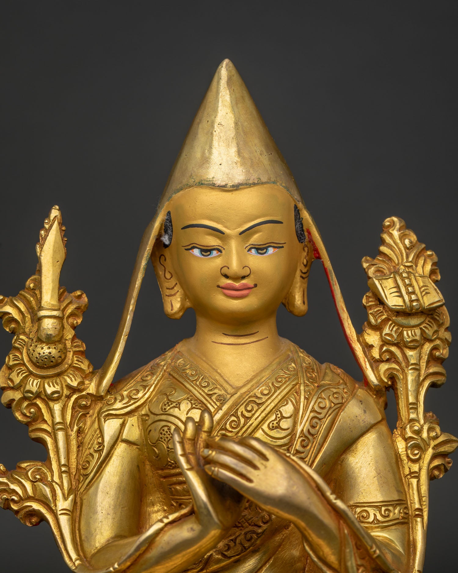 Je Tsongkhapa performing Dharma Chakra Mudra with utpala flowers and sacred symbolism