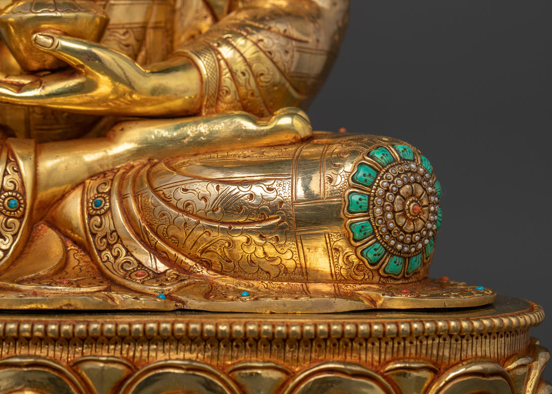 the jemstone adorned leg of golden buddha statue